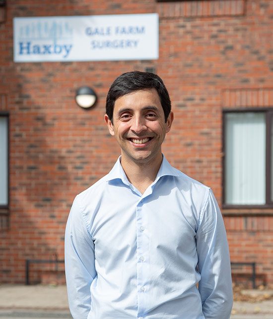 Dr Thomas Patel-Campbell stands outside the Gale Farm Surgery.